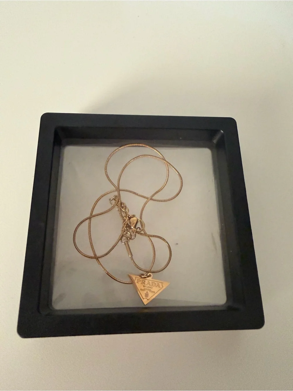 Gold Triangle Logo Pendant Necklace